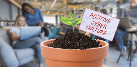 a plant sprouting in an office 'positive cyber culture'